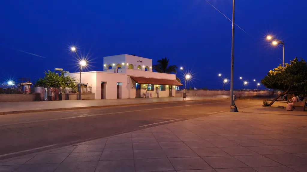 Puducherry’s seafront promenade lit up at dusk, facing the Bay of Bengal